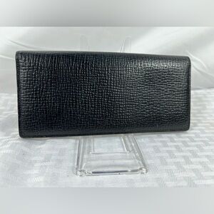 1056: Burberry Black Textured Leather Wallet with Nova Check Interior Trim